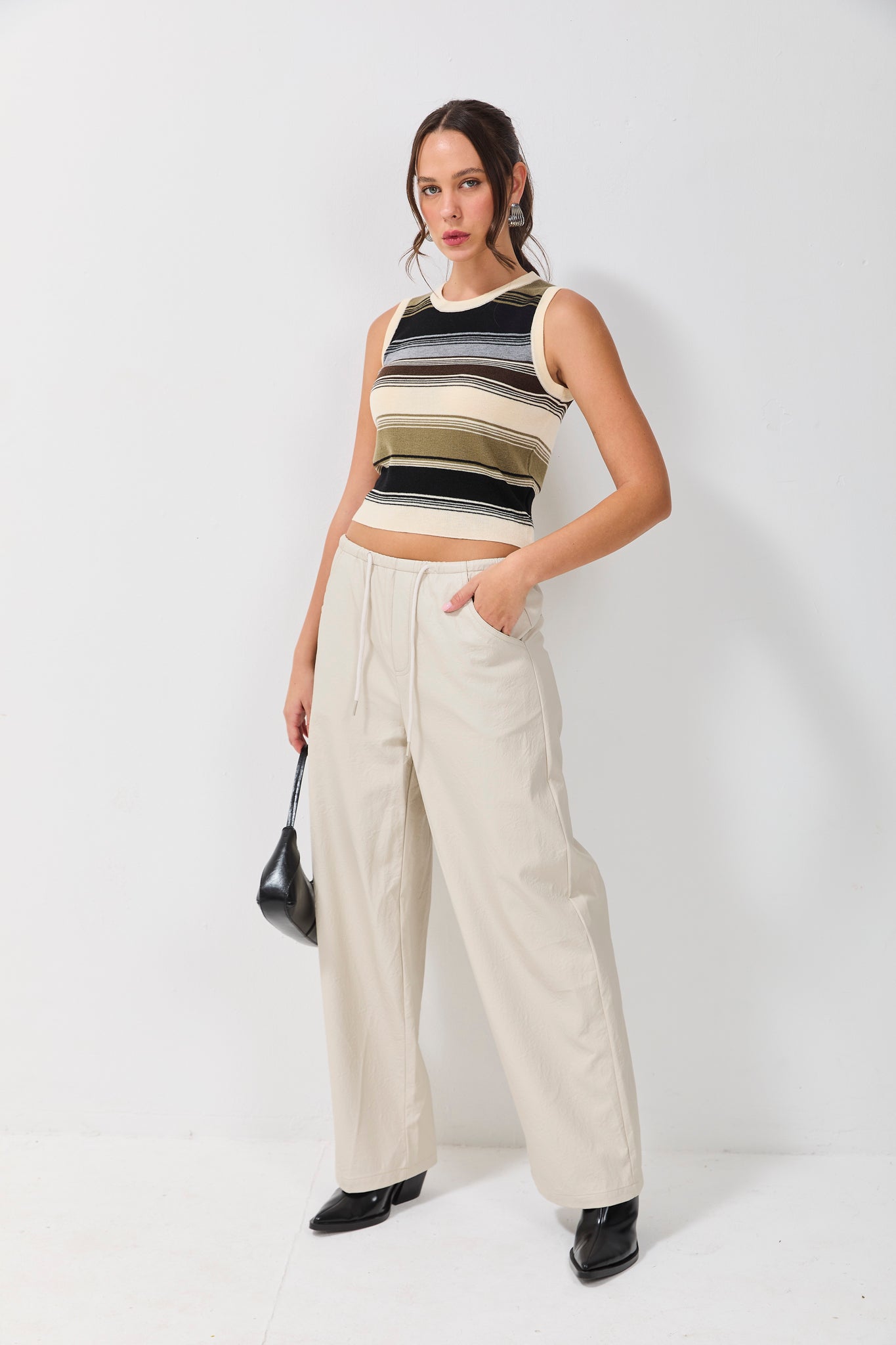 מכנס שחף דמוי עור שמנת